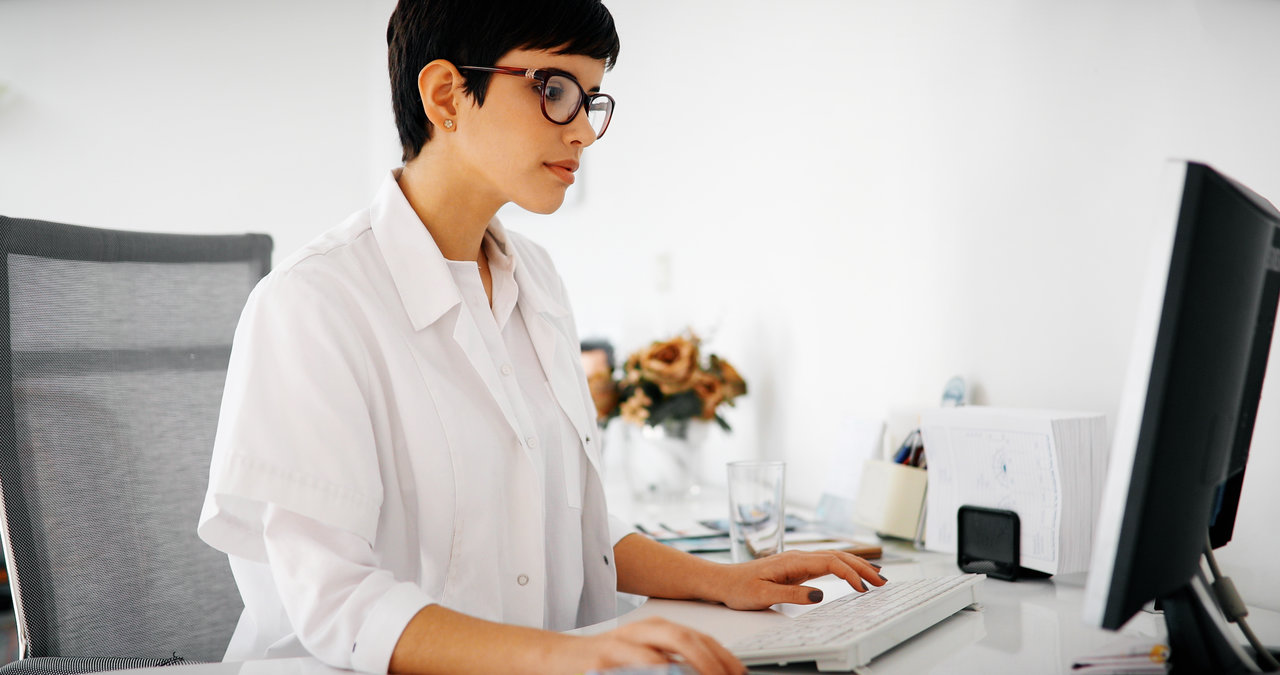 Doctor working at computer